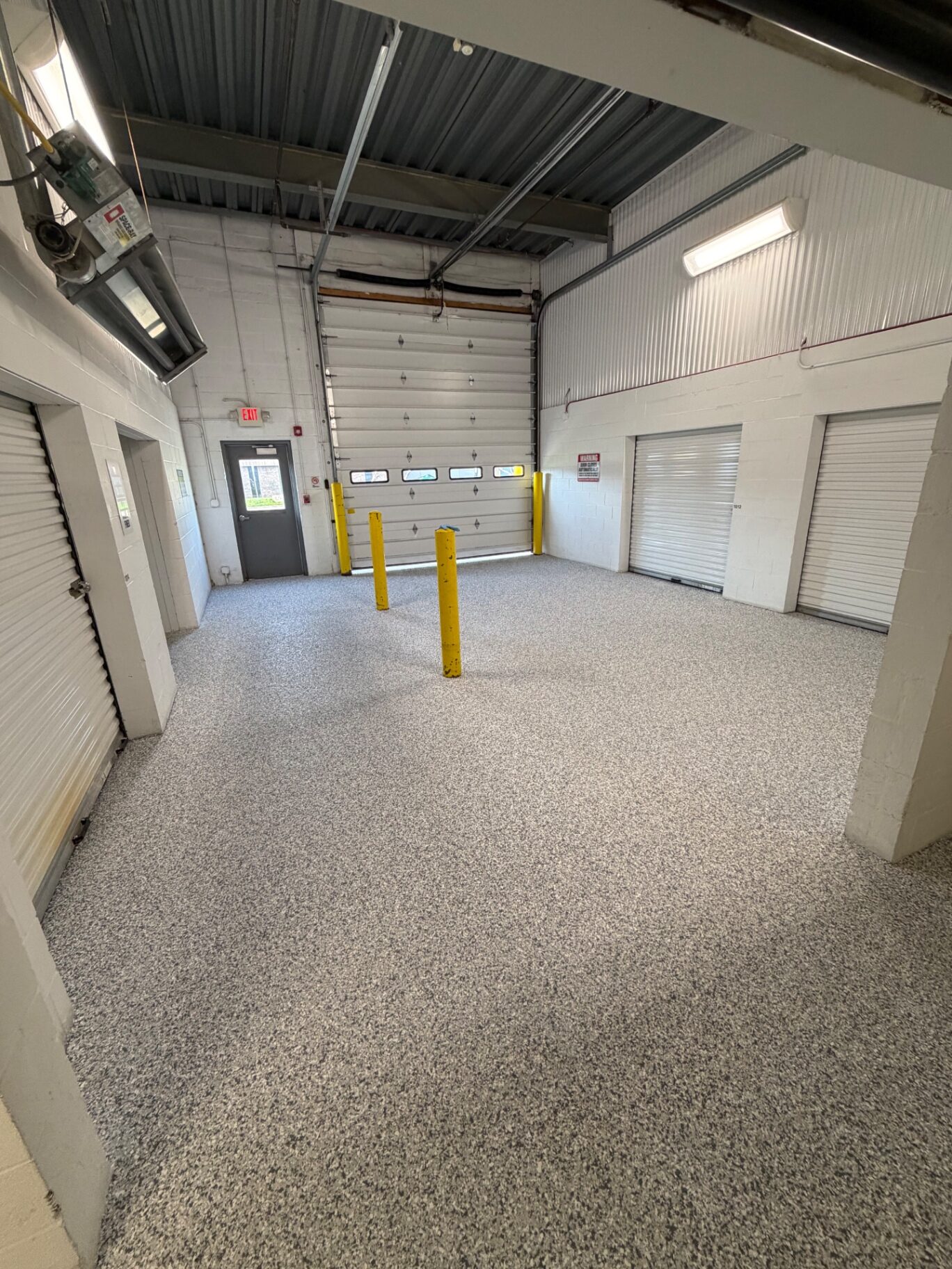 Full Broadcast Flake — Commercial Storage Facility after installation - high gloss finished concrete coating